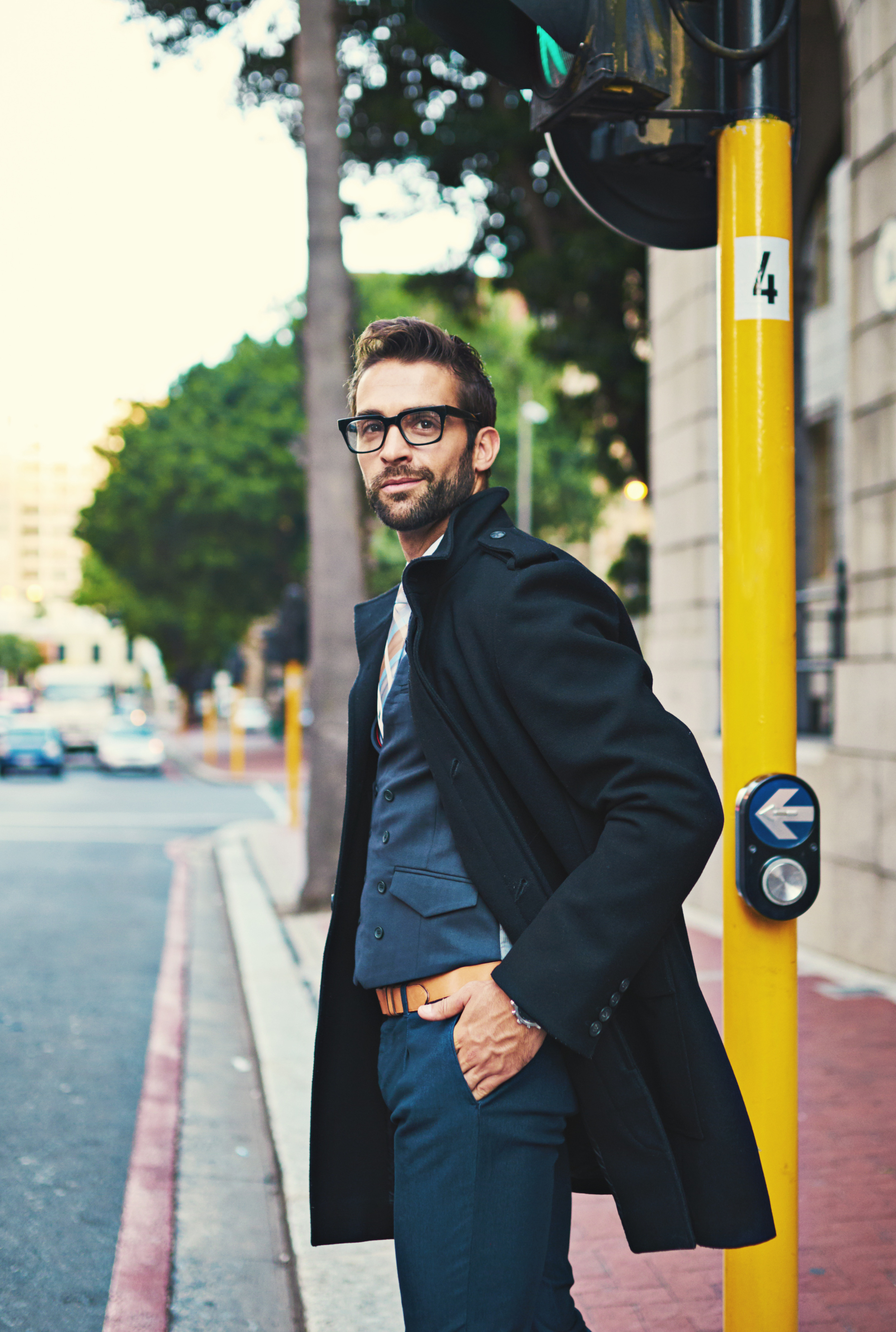 Julian standing on a city street